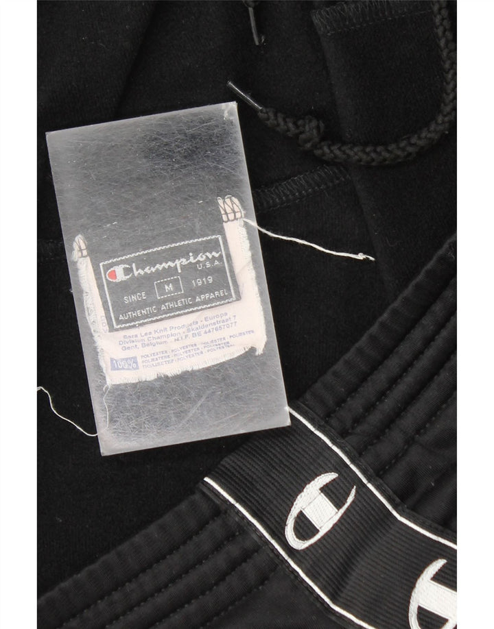 CHAMPION Pantalones de chándal con estampado gráfico para hombre Poliéster negro mediano