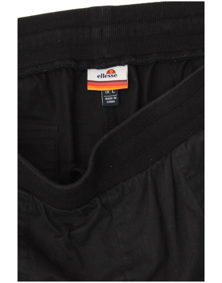 ELLESSE Pantalones de chándal con estampado gráfico para mujer Joggers UK 40 Large Black