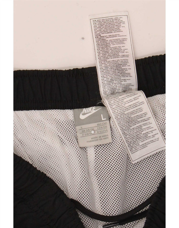 Nike - Pantalones de chándal para hombre, color negro, poliéster