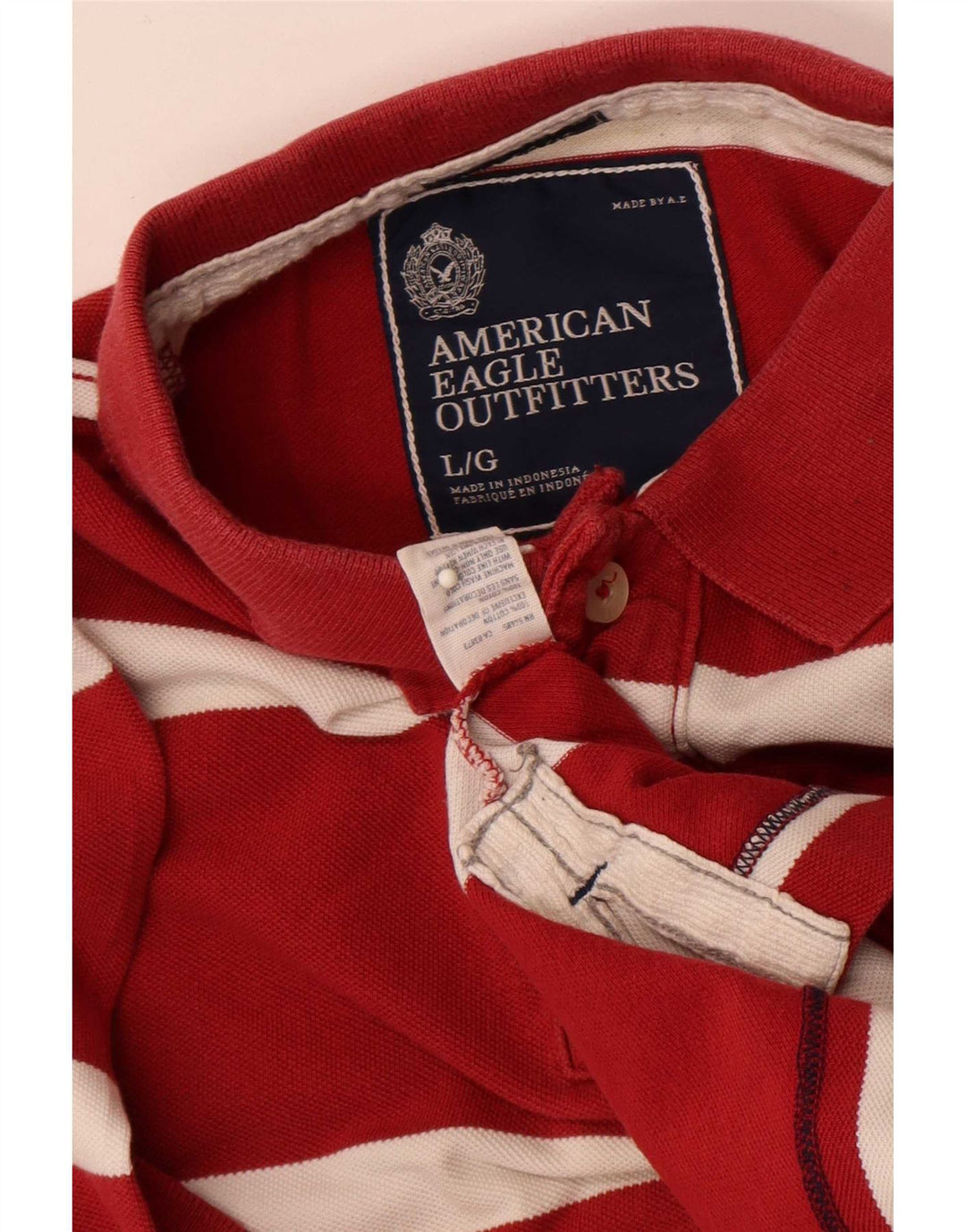American Eagle Polo de manga corta para hombre con ajuste regular y rayas rojas grandes