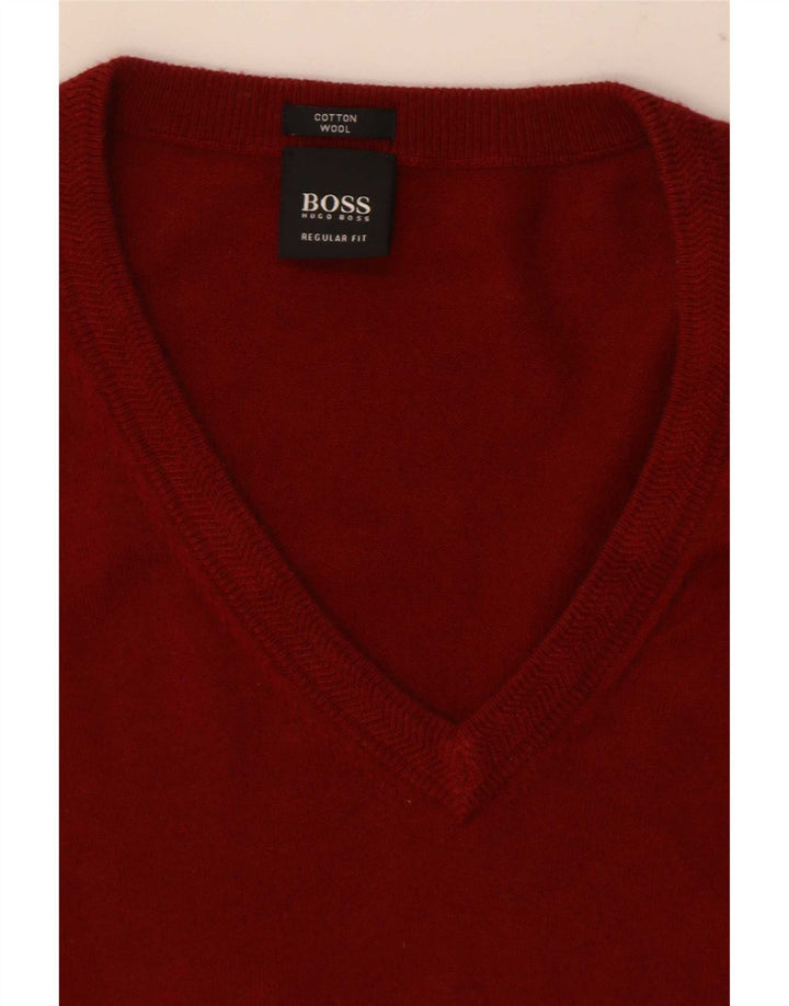 Hugo Boss Hombre Jersey de corte estándar con cuello en V y diseño colour block en rojo medio