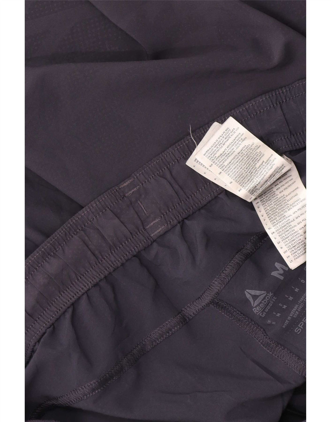Reebok Pantalones cortos deportivos Speedwick Graphic para hombre, poliéster de camuflaje gris medio