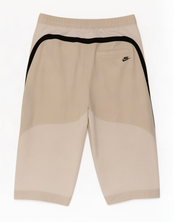 Nike Bermudas deportivas para niños 10-11 años Beige Poliéster color block