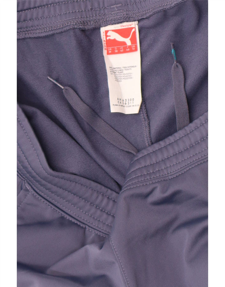 Puma - Pantalones de chándal para mujer, talla 40, poliéster, color azul medio