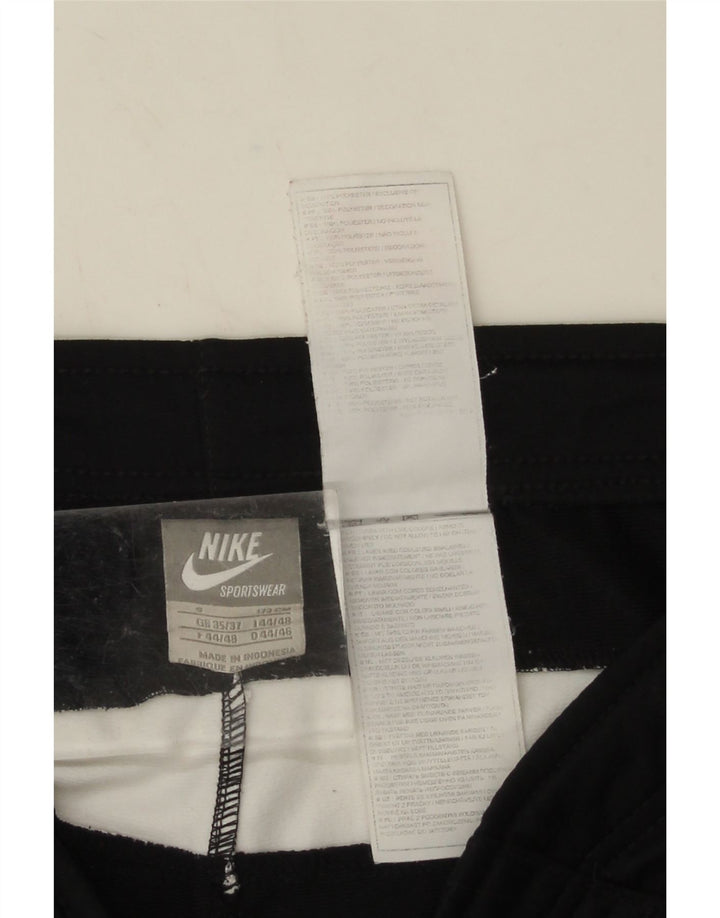 Nike - Pantalones de chándal para hombre (talla pequeña), color negro y poliéster