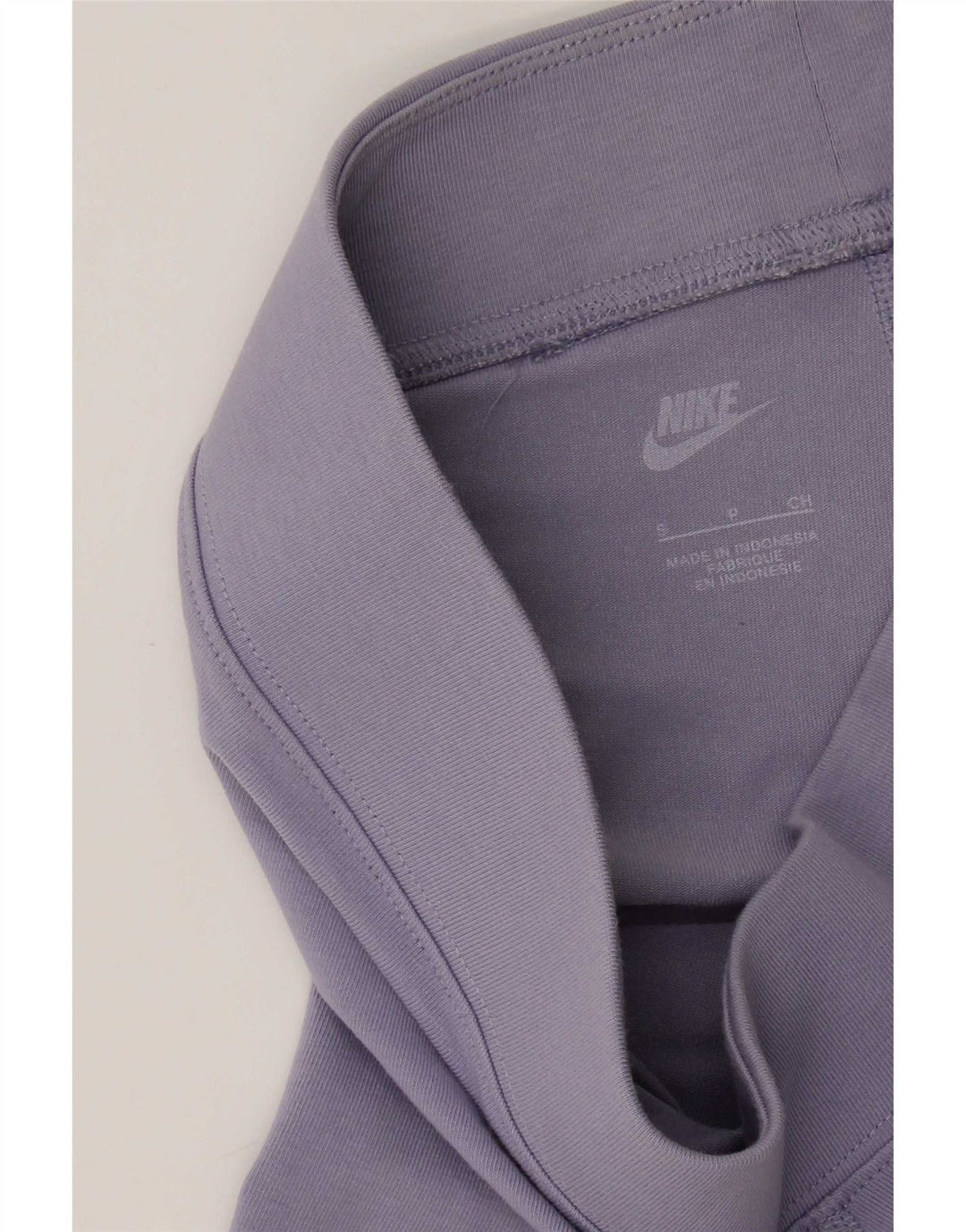 Nike - Pantalones cortos deportivos para mujer (talla 8), color morado
