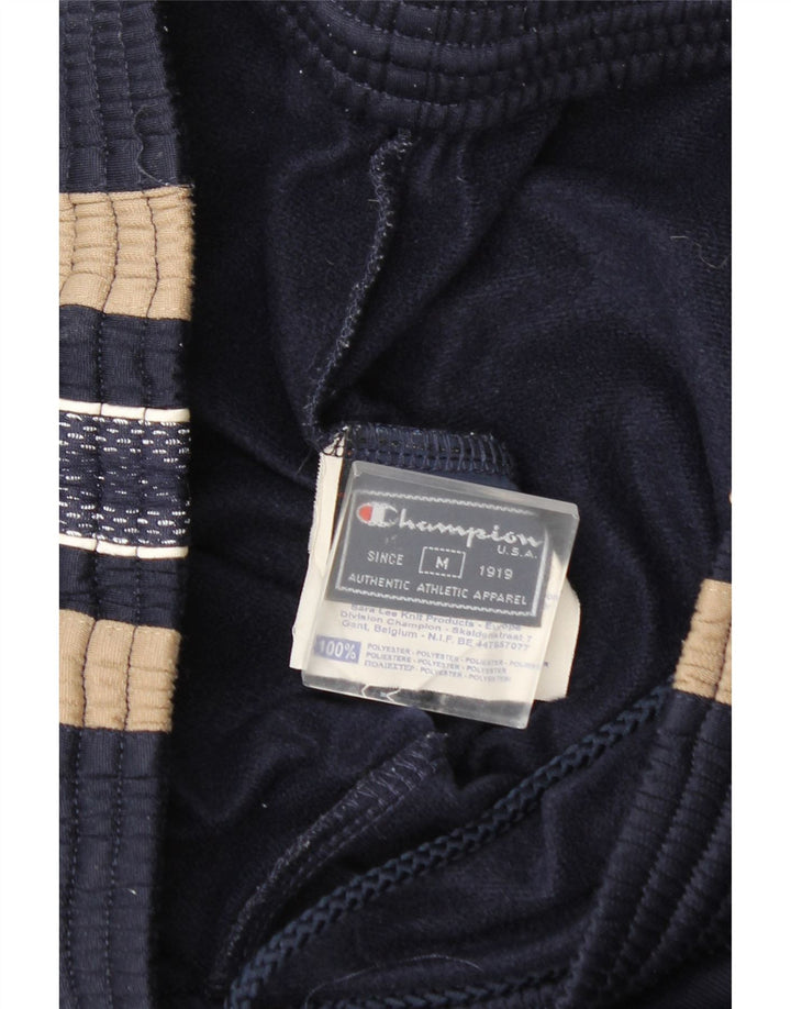 Champion Pantalones De Chándal Gráficos En Azul Marino Medio Colorblock
