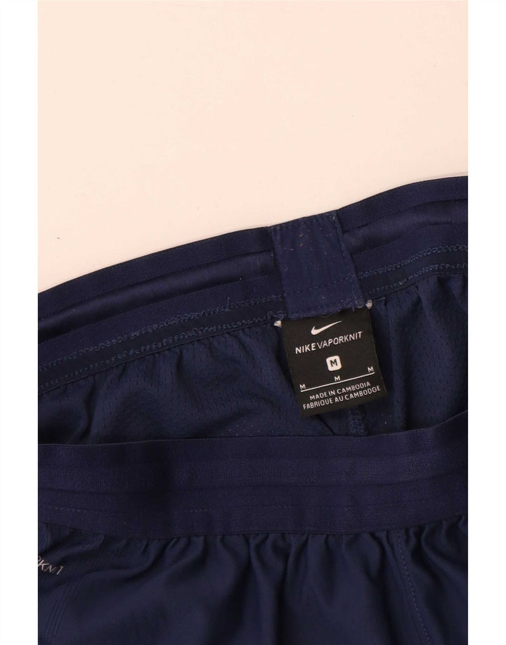 Pantalones cortos deportivos con estampado gráfico en azul marino mediano de Nike para hombre