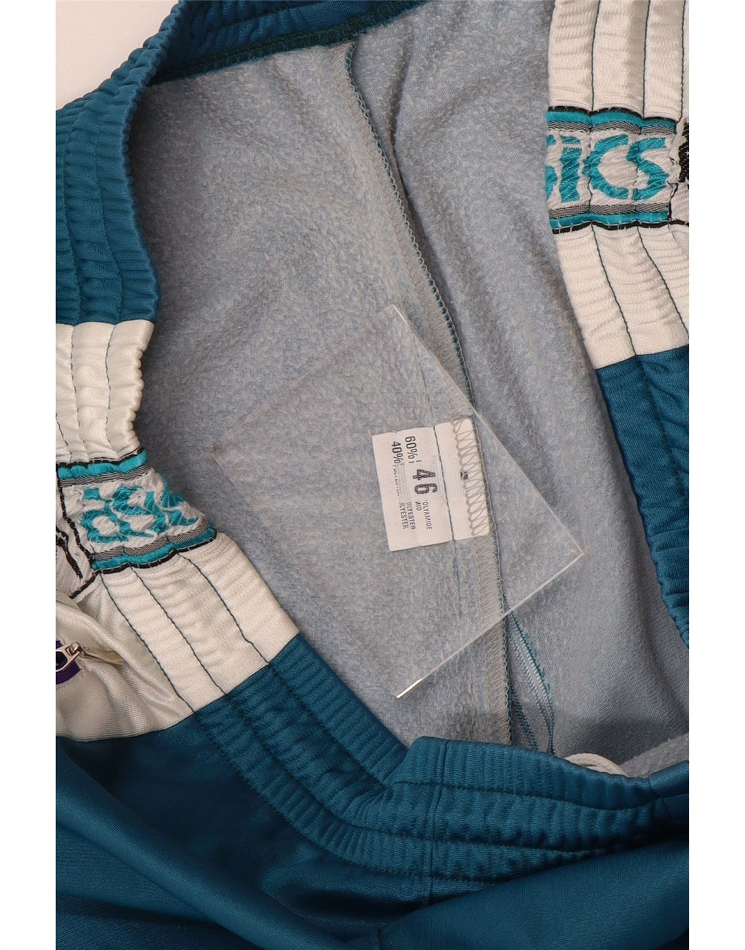 ASICS Pantalones de chándal gráficos para hombre IT 46 Small Blue Colourblock