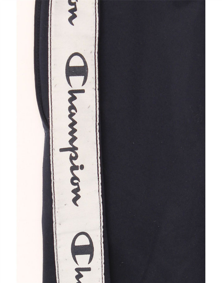 Champion Pantalones De Chándal Gráficos En Azul Marino Medio Colorblock