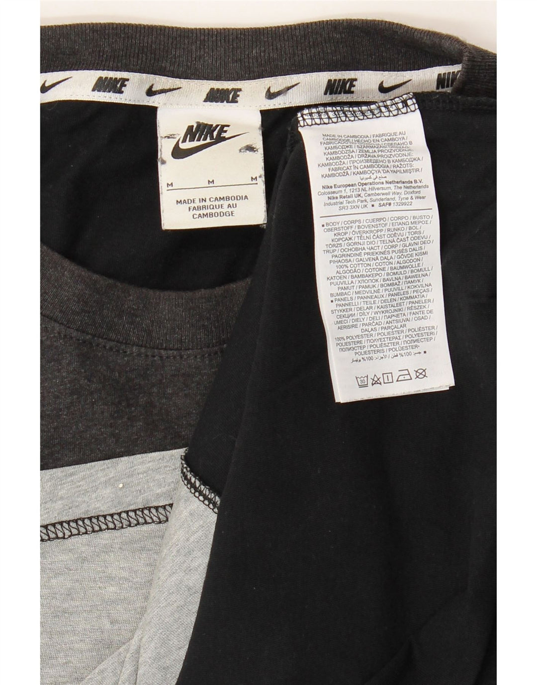 Nike Camiseta gráfica para hombre Top mediano negro de algodón con bloques de color