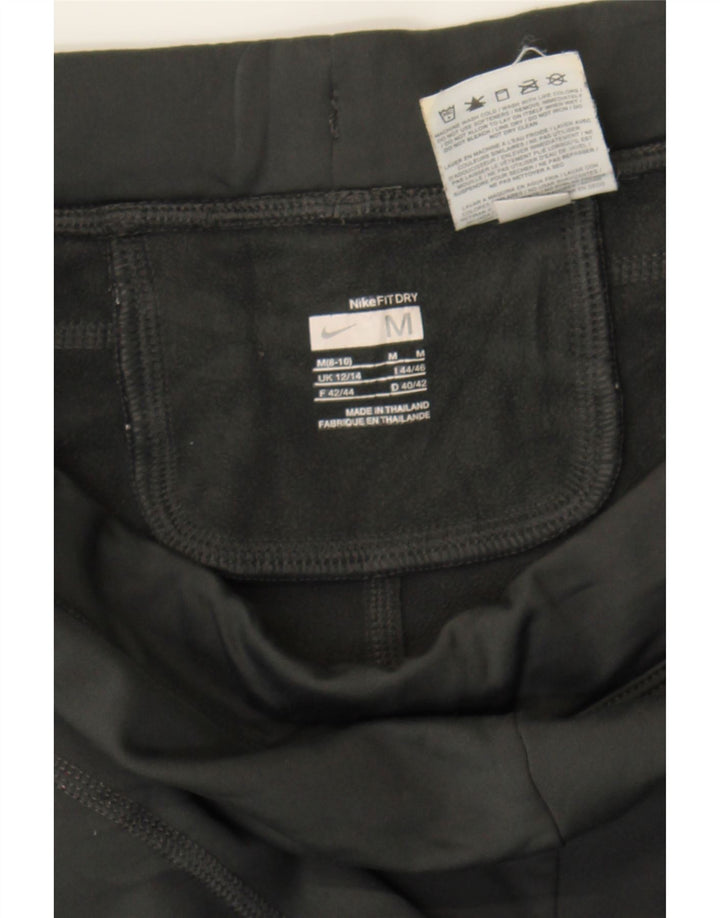 NIKE Womens Tracksuit Trousers UK 12/14 Medium  Black Polyester Vintage Nike and Second-Hand Nike from Messina Hembry 