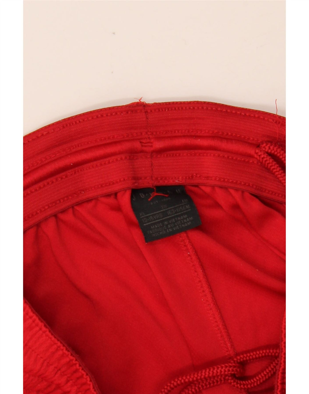 JORDAN Pantalones cortos deportivos con gráfico Dri Fit para niños 13-14 años XL Bloque de color rojo