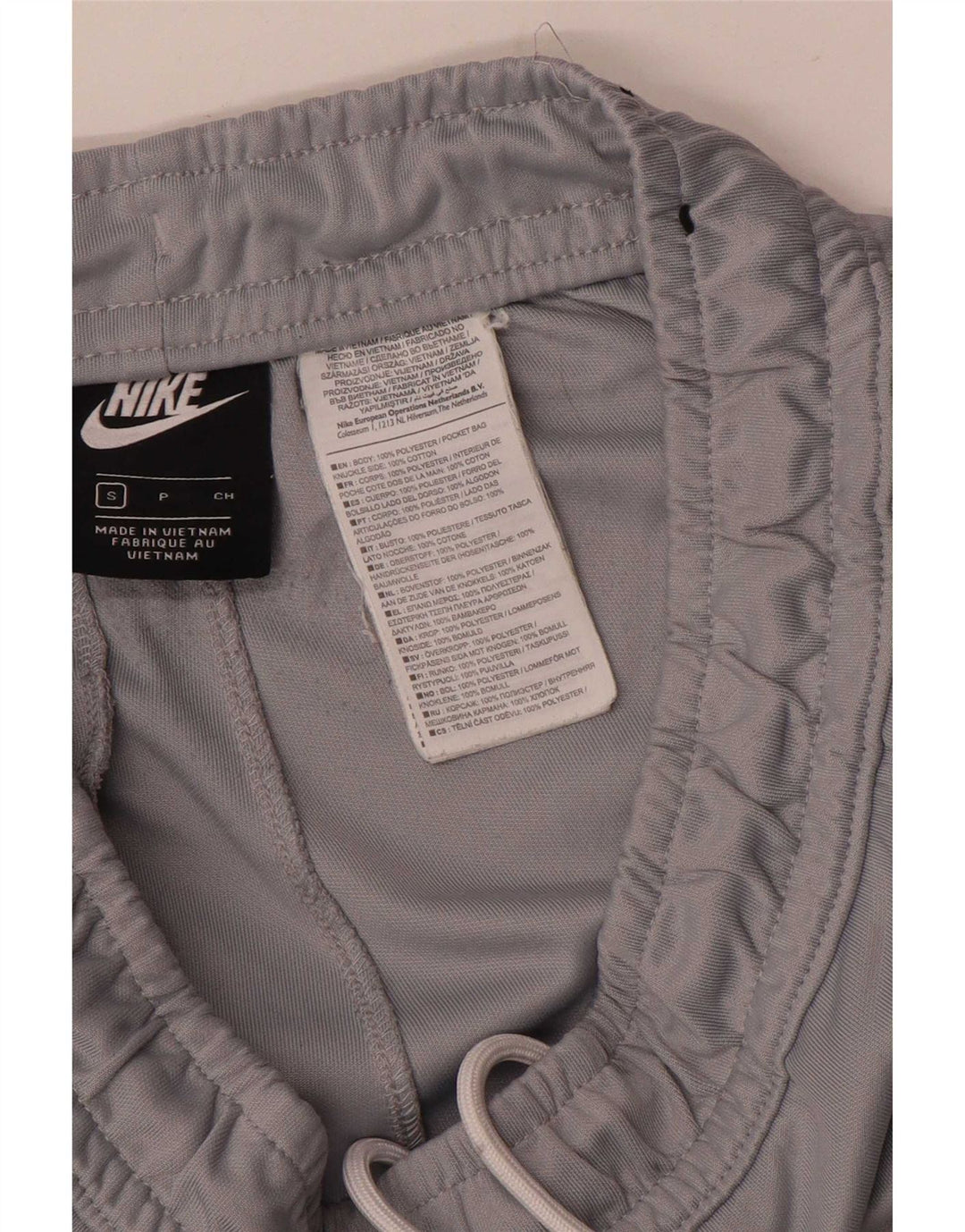 Nike - Pantalones de chándal con estampado gráfico para hombre, poliéster color block, pequeño, gris