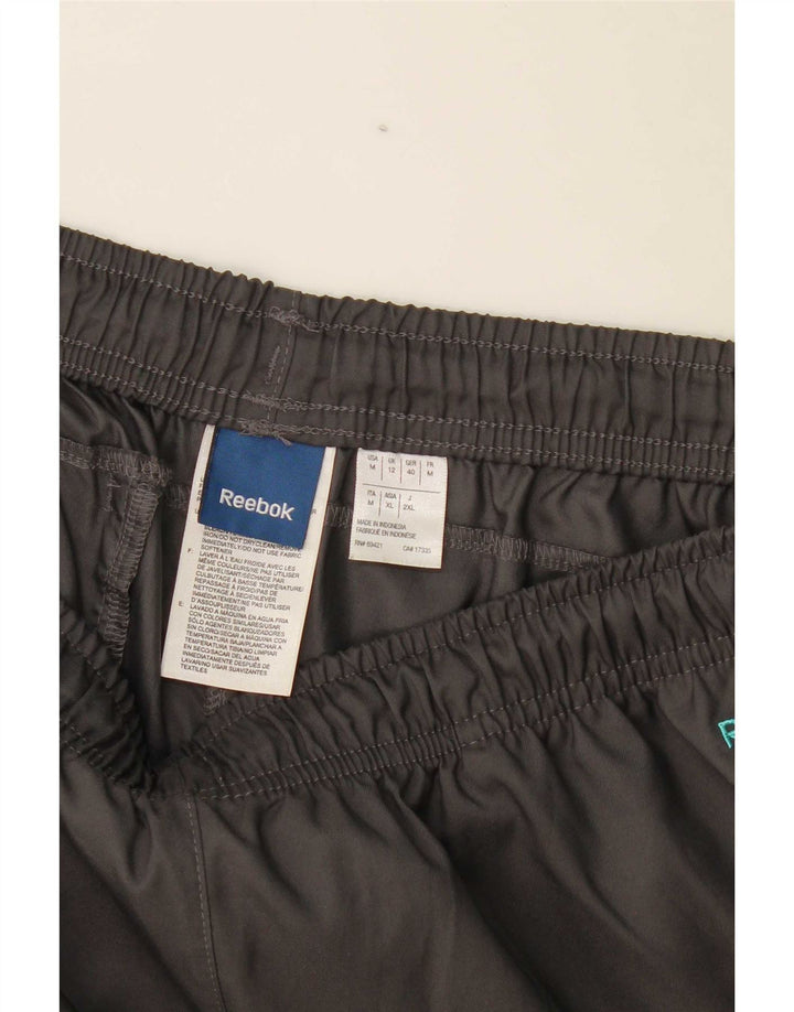Reebok - Pantalones de chándal para mujer (talla 40), color gris medio, poliéster