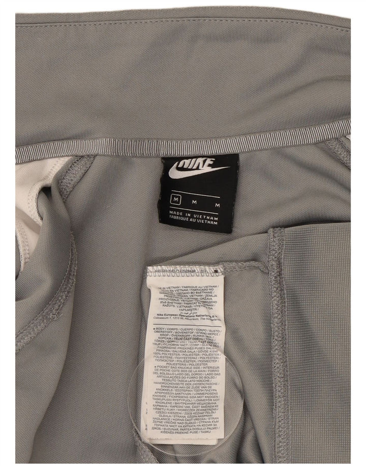 Nike Chaqueta deportiva con gráfico Swoosh y bloques de color gris medio para hombre