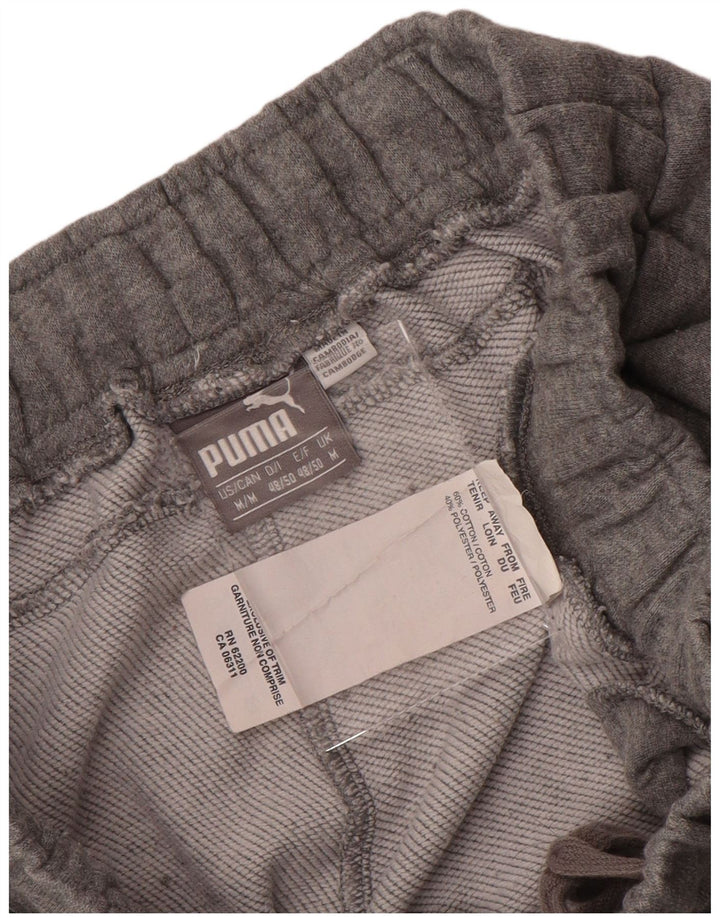 PUMA Pantalones de chándal con estampado gráfico de algodón moteado en gris medio para hombre