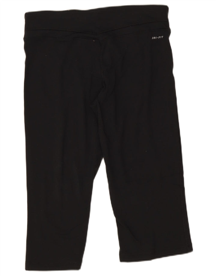Nike - Leggings capri Dri Fit para mujer, talla M, nailon negro