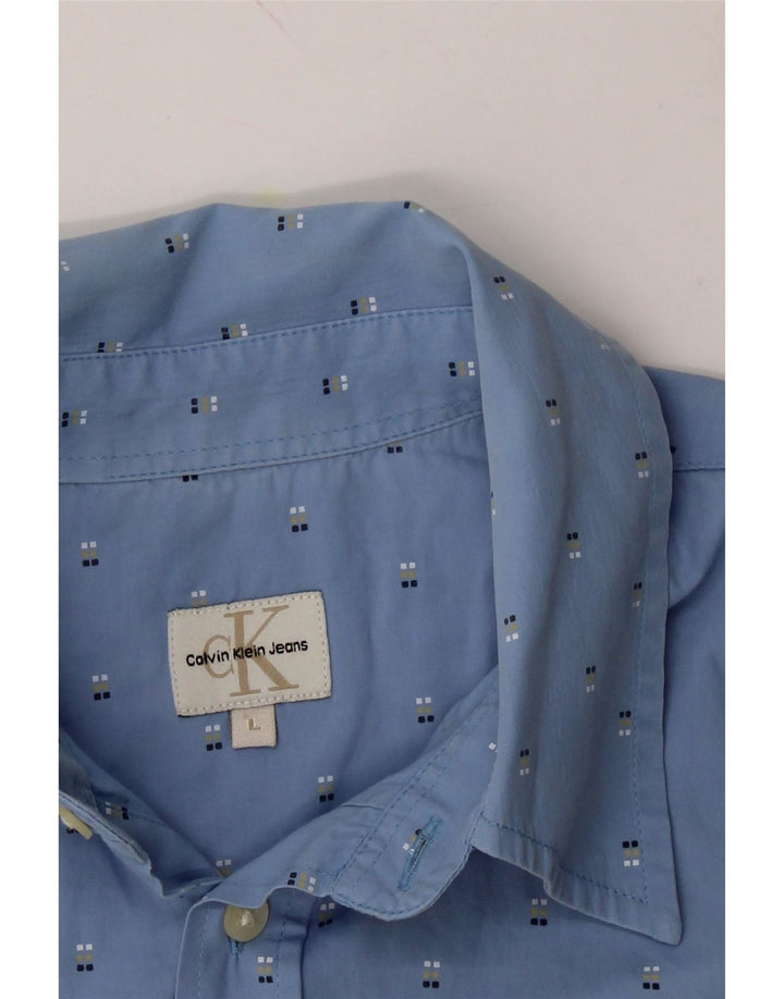 CALVIN KLEIN JEANS Mens Short Sleeve Shirt Large Blue Spotted Vintage Calvin Klein Jeans and Second-Hand Calvin Klein Jeans from Messina Hembry 