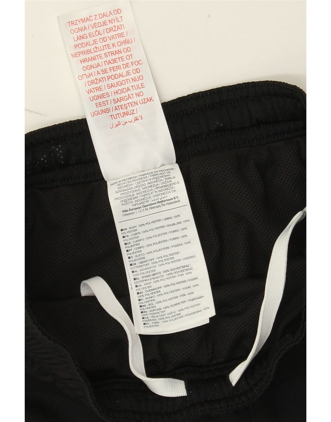 Nike Pantalones cortavientos Dri Fit para niños 12-13 años Grande Negro Poliéster