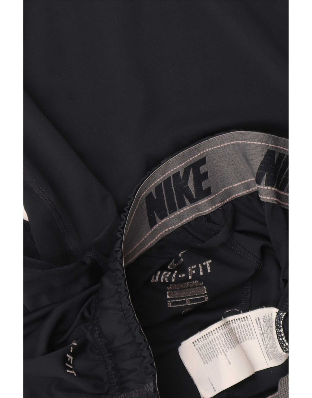 Nike - Pantalones cortos deportivos Dri Fit para mujer, talla 44, poliéster, color azul marino mediano