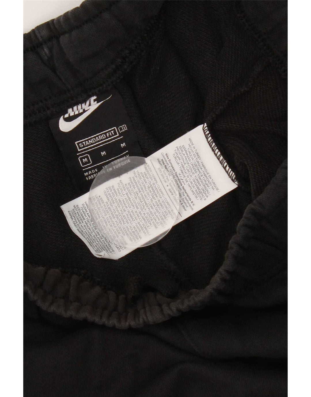 Nike Pantalones cortos deportivos de ajuste estándar para hombre, algodón negro mediano