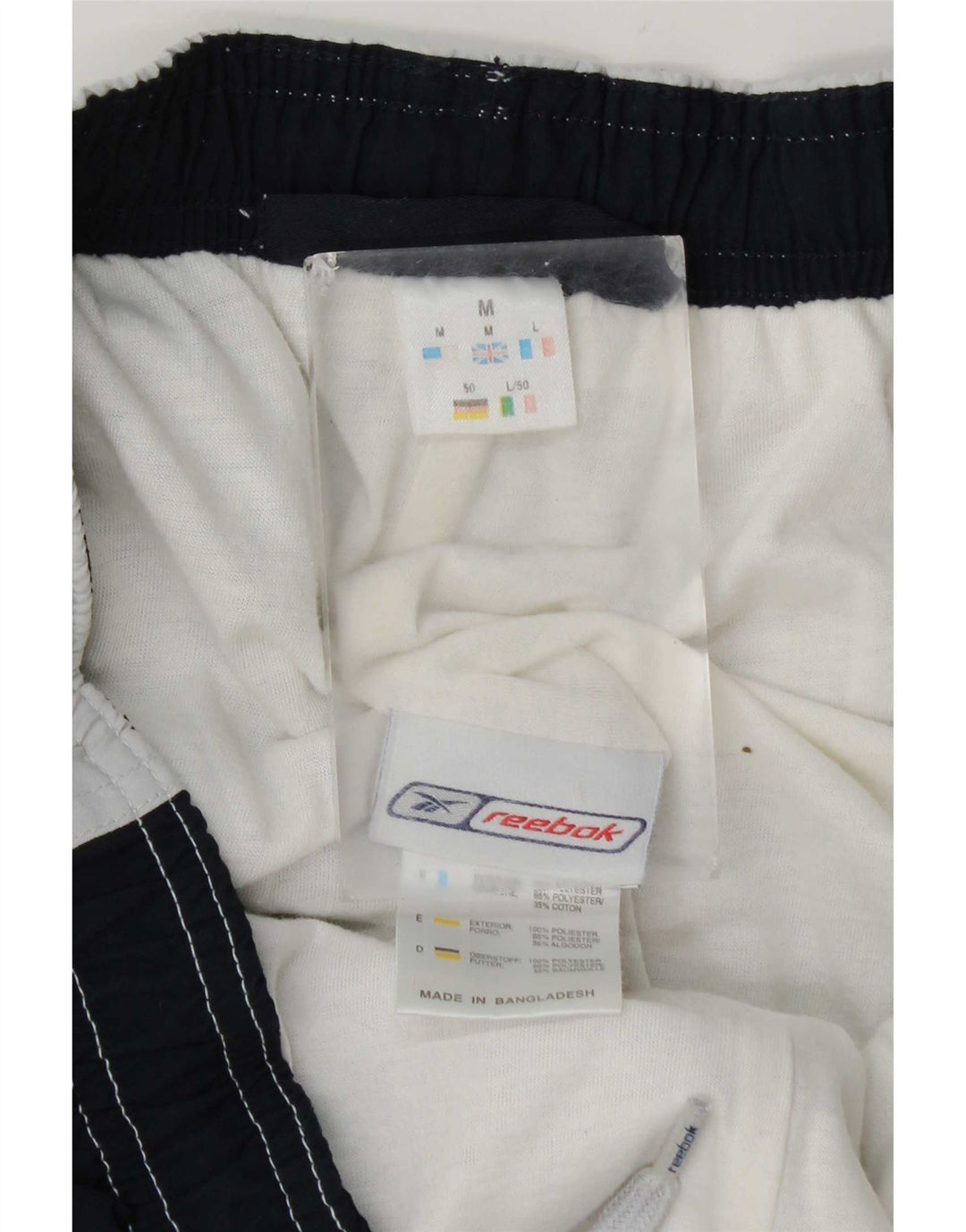 Bermudas deportivas Reebok Hombre Gris medio Colorblock Poliéster
