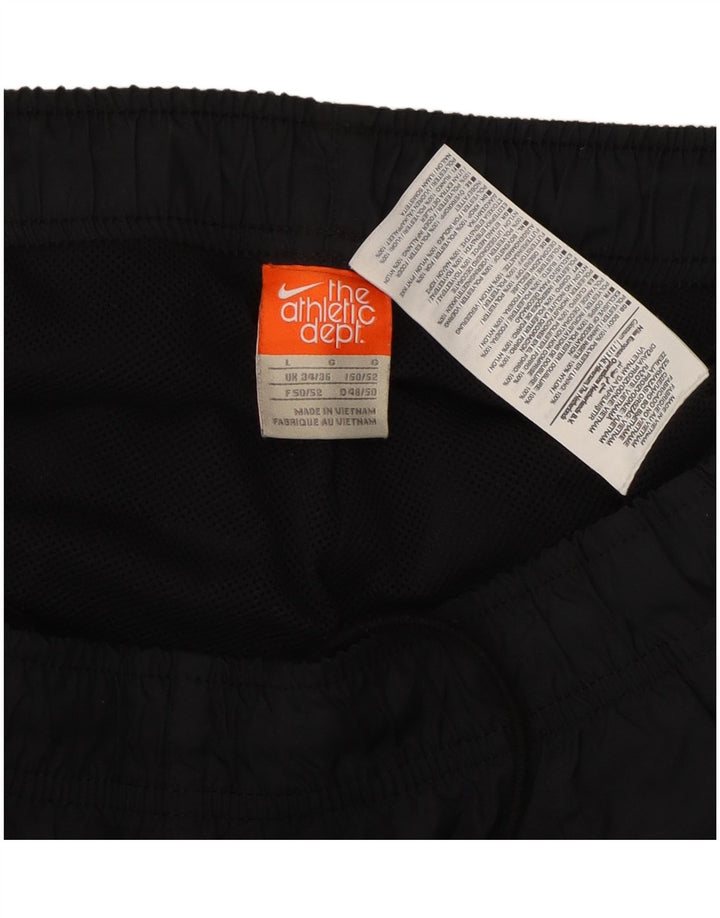 Nike - Pantalones de chándal para hombre, color negro, poliéster