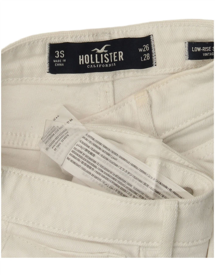 HOLLISTER Vaqueros pitillo desgastados de cintura baja para mujer W26 L28 Algodón blanco