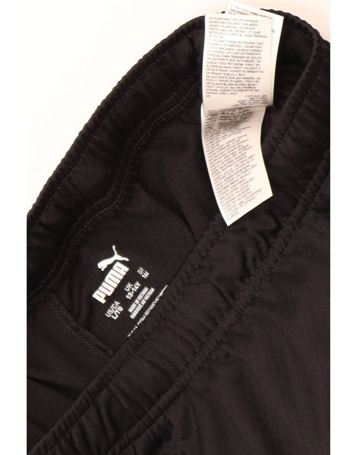 PUMA Pantalones de chándal para niño 13-14 años Negro Poliéster color block