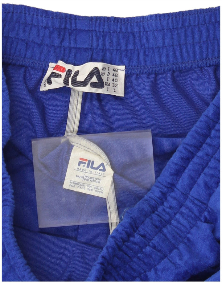 Fila Pantalón de chándal de terciopelo para hombre Joggers IT 48 Poliéster azul medio