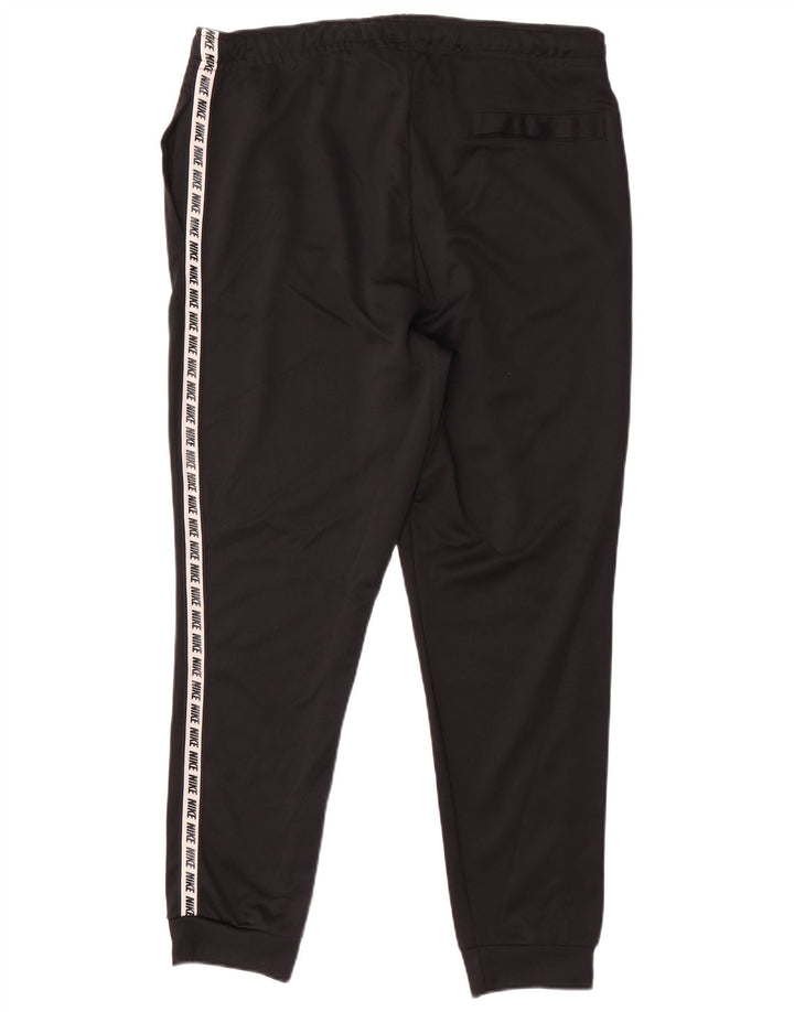 NIKE Hombre Pantalones de chándal con gráfico Joggers Large Poliéster negro