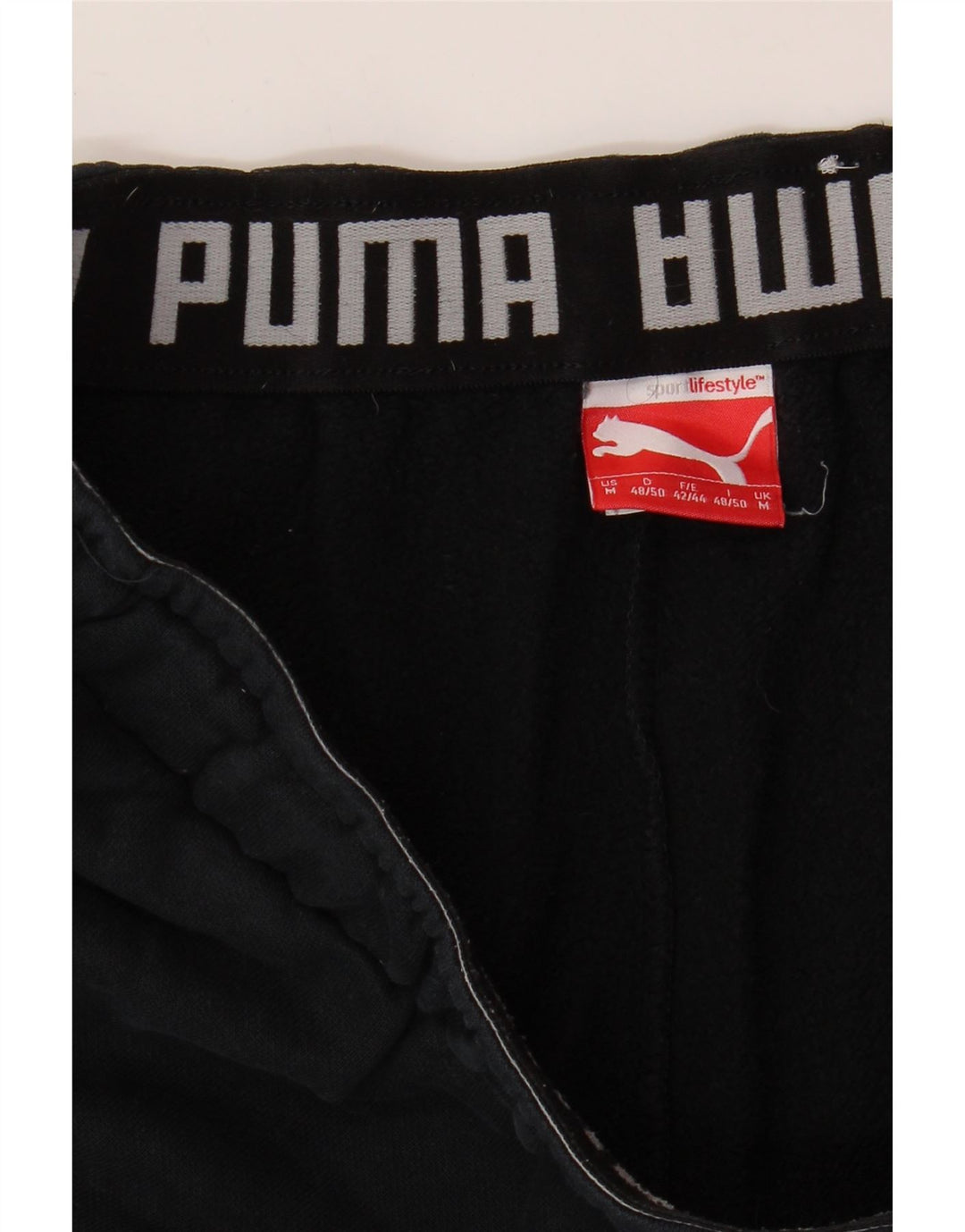 PUMA Pantalones de chándal con estampado gráfico Joggers Medium Black para hombre