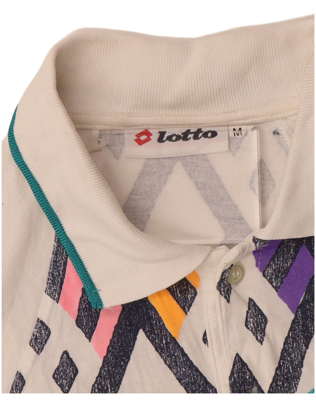 LOTTO Polo Hombre Medio Blanco Geométrico