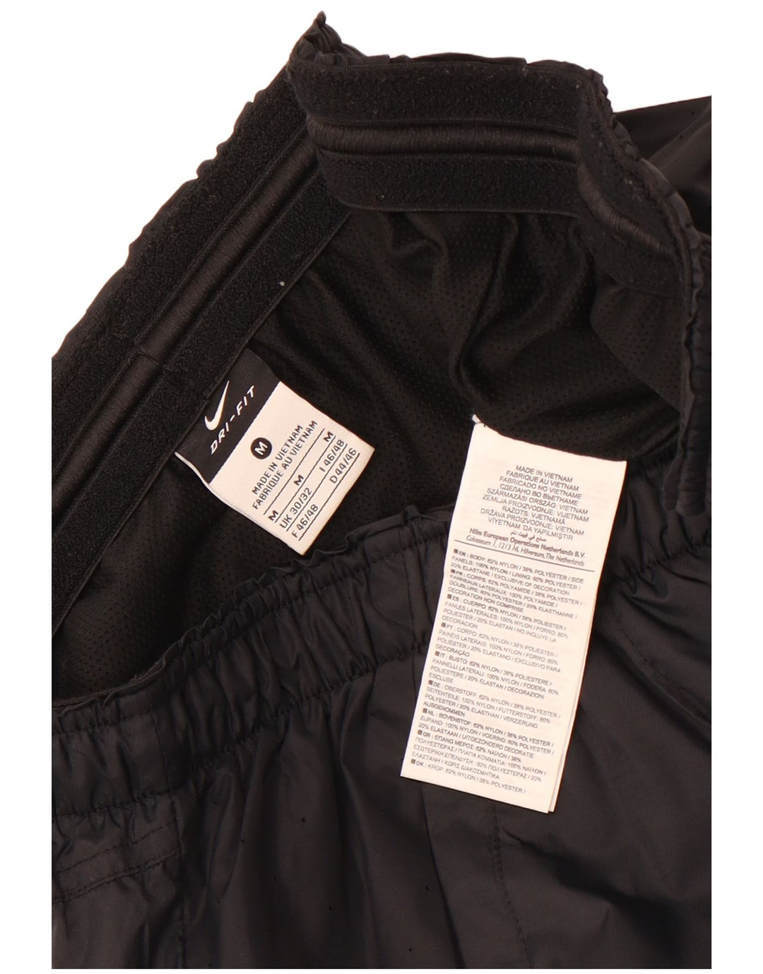 Nike - Pantalones de chándal para mujer, talla 30/32, nailon negro mediano