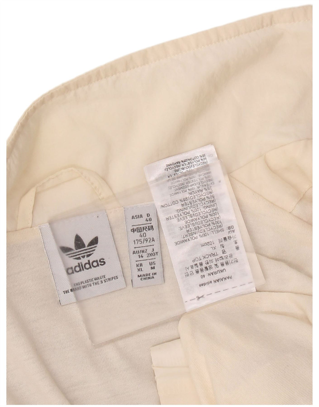 Adidas - Chaqueta de chándal gráfica para mujer, talla 40, talla grande, color blanco roto, poliamida