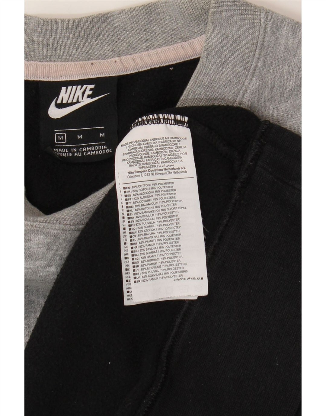 Nike - Sudadera tipo jersey de algodón color block en negro mediano