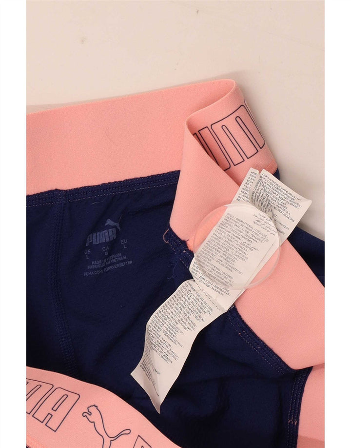 Pantalones cortos deportivos con estampado gráfico de poliéster en color azul grande para mujer Puma