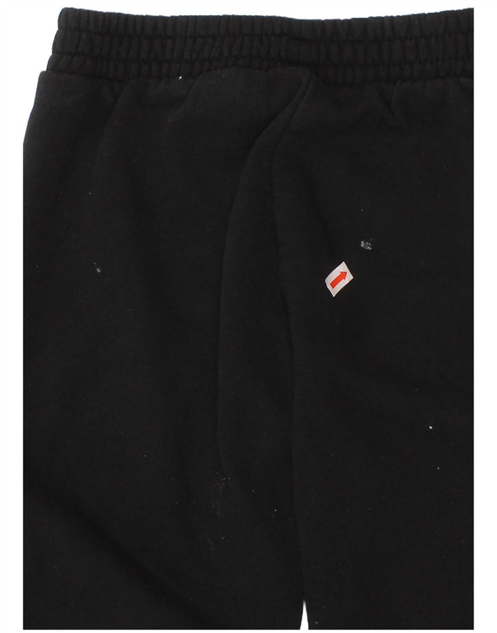 Puma Pantalones de chándal con estampado gráfico para niños 4-5 años Algodón negro