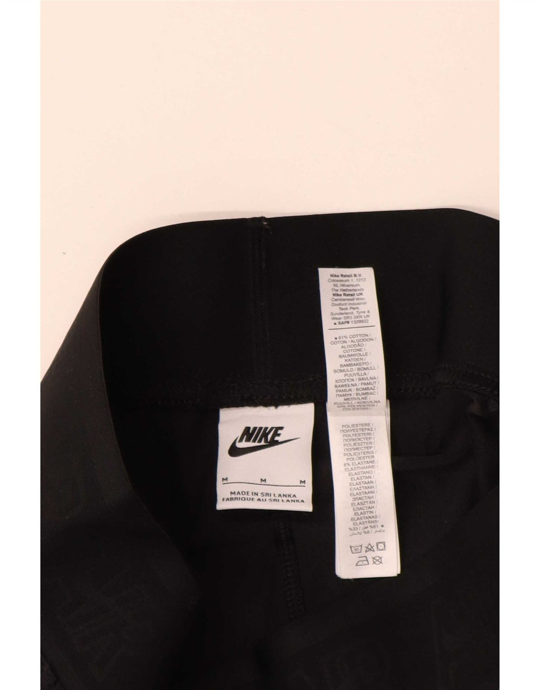Nike - Leggings gráficos para mujer (talla 40), algodón negro mediano