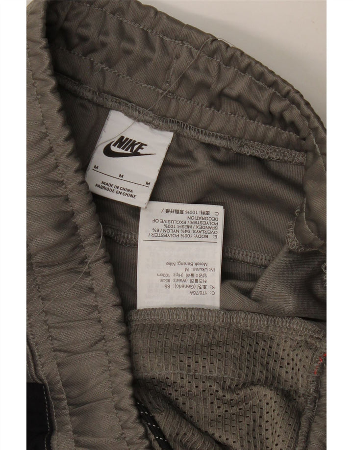 NIKE Hombre Pantalones de chándal Joggers Gris Medio Colorblock Poliéster