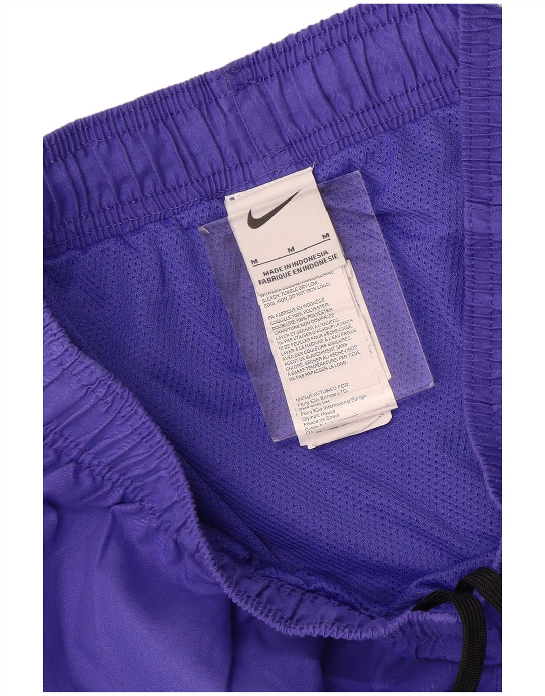 Pantalón corto deportivo Nike Hombre Poliéster morado medio
