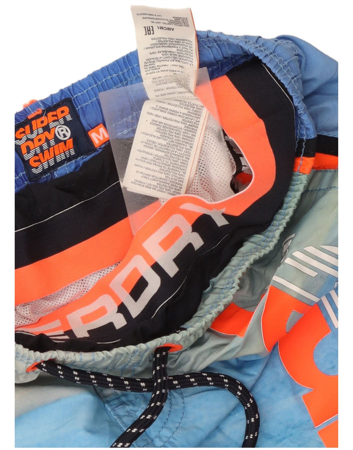 Superdry Bañador con estampado gráfico para hombre, poliéster a rayas en azul medio