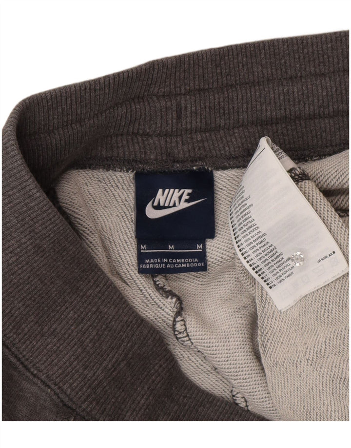 NIKE Hombre Pantalones de Chándal Joggers Gris Medio Algodón