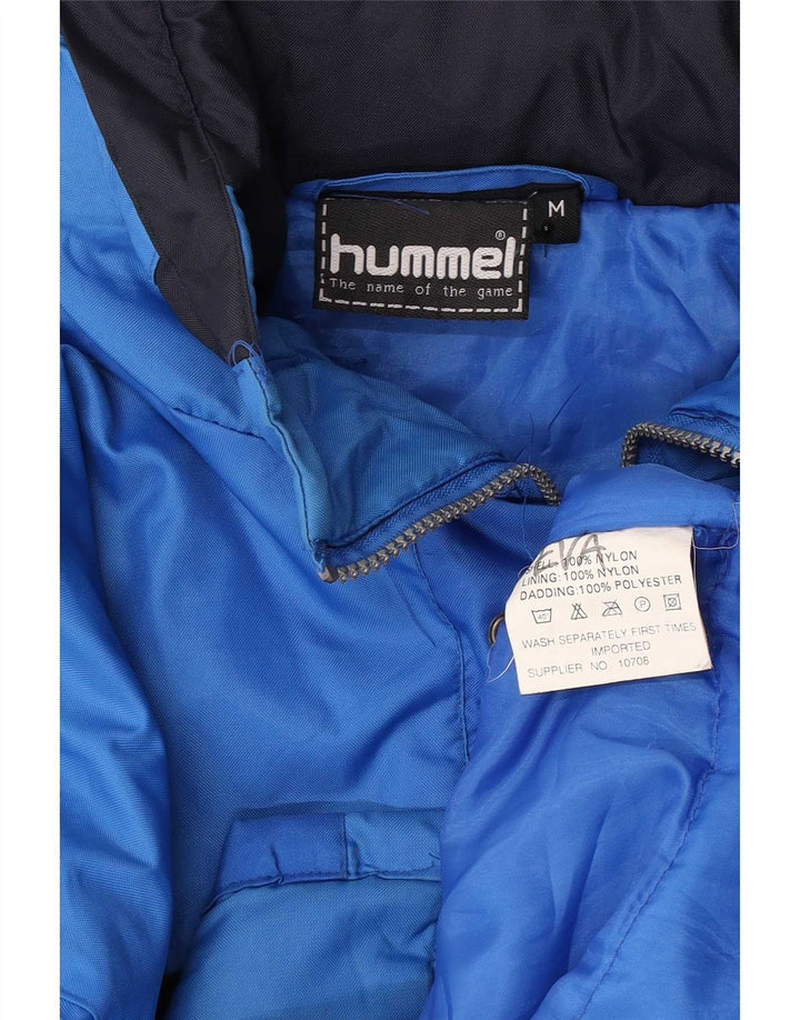 Hummel Chaqueta cortavientos con gráfico de corte holgado para hombre UK 38 Azul medio