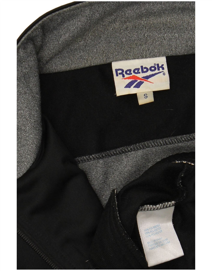REEBOK Chaqueta superior de chándal con gráfico de corte holgado para hombre Small Black Colourblock