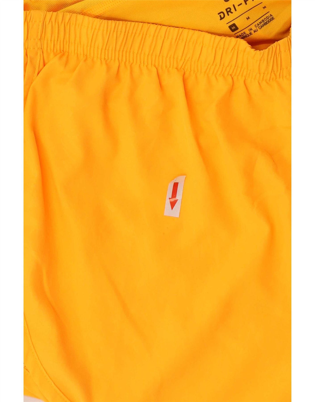 Nike - Pantalones cortos deportivos Dri Fit para mujer, talla 40, poliéster, color naranja medio