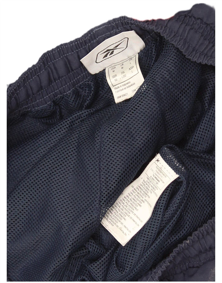 Reebok Pantalón De Chándal Gráfico Joggers Medium Azul Marino Colorblock