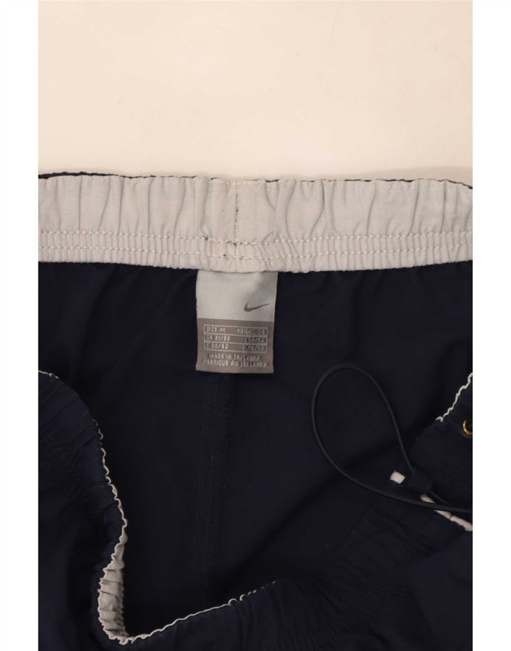 Pantalones cortos deportivos Nike para hombre de nailon azul marino mediano