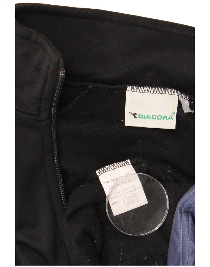 DIADORA Hombre Chaqueta de Chándal Superior Poliéster Color Block Mediano Negro